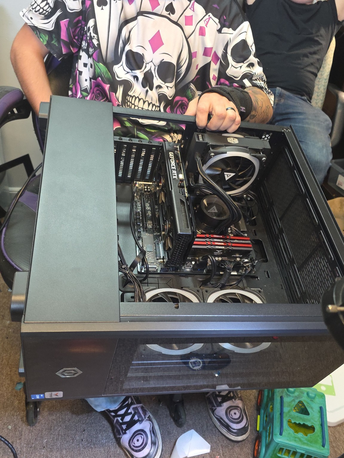 Open desktop computer undergoing repair